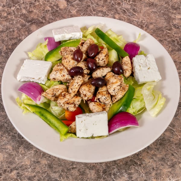 Mr. G's Pizzeria's chicken salad with lettuce, feta, olives, red onion, and green pepper.